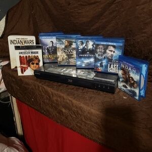 Dvd player and bundle of movies